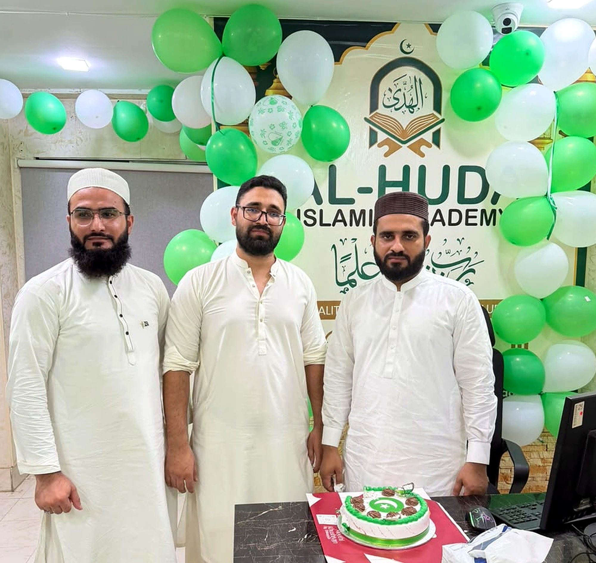 Office staff of Al-Huda Islamic Academy at the desk
